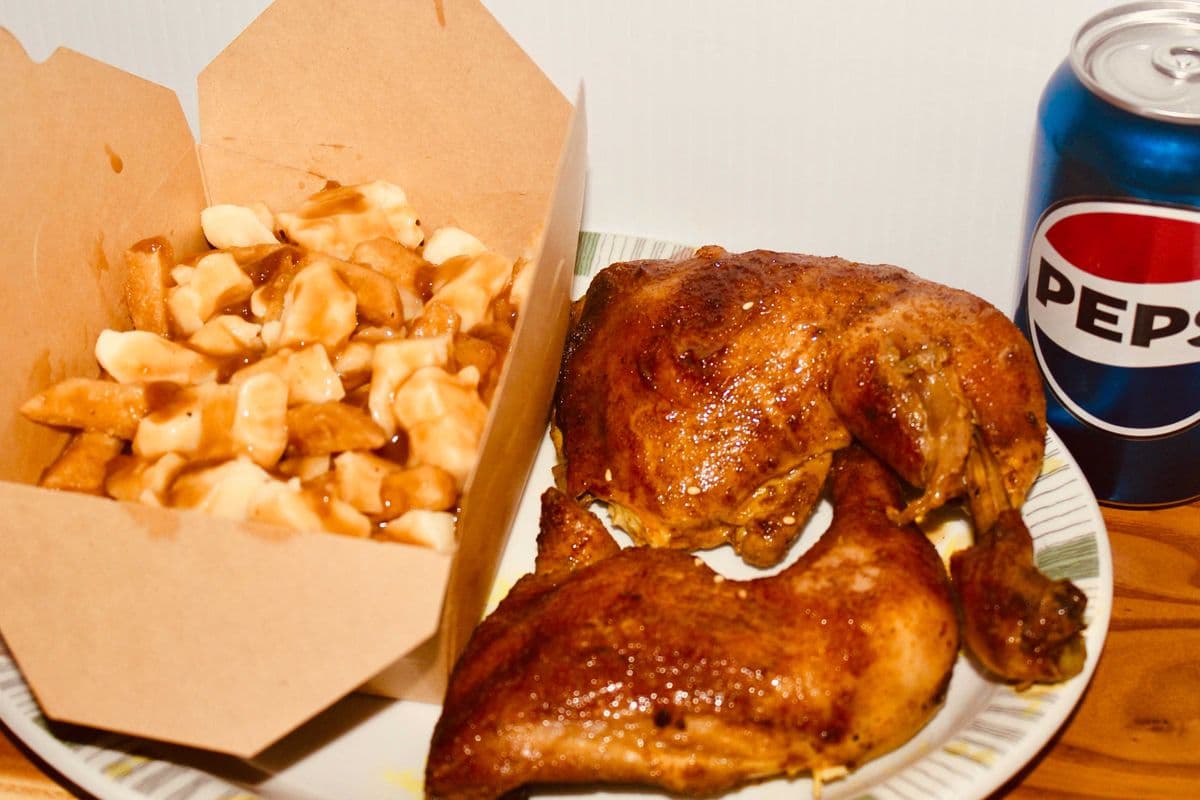 2xChicken Leg quarters, poutine and a can of pop