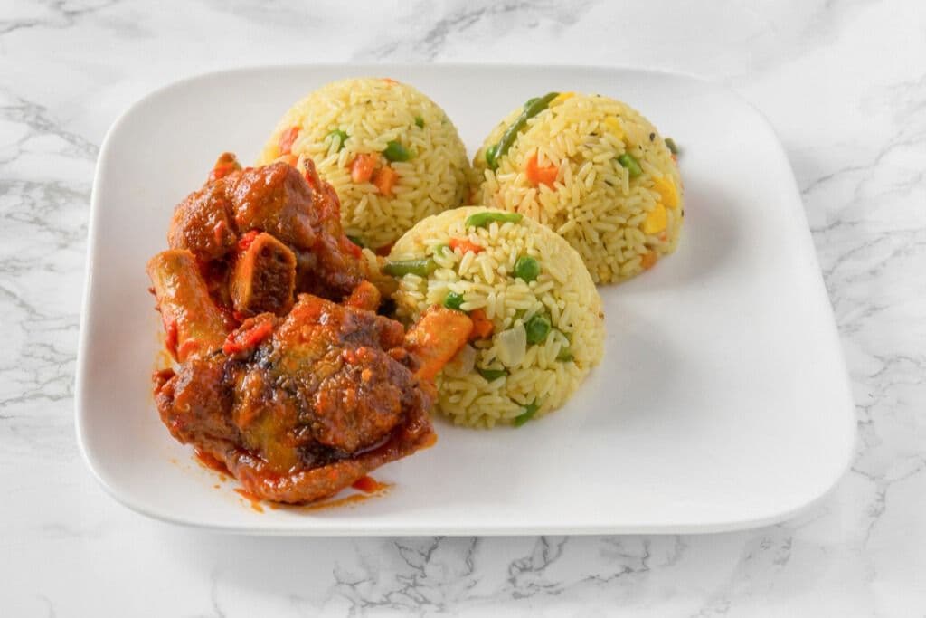 Fried Rice and Two Pieces of Peppered Turkey
