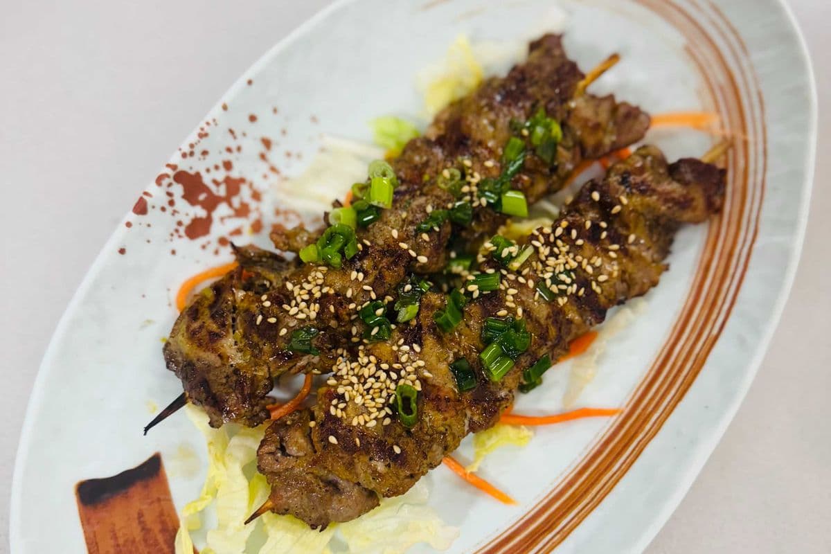A6. Grilled Meat on Skewers (2 pcs) - Thịt Xiên Nướng Lụi