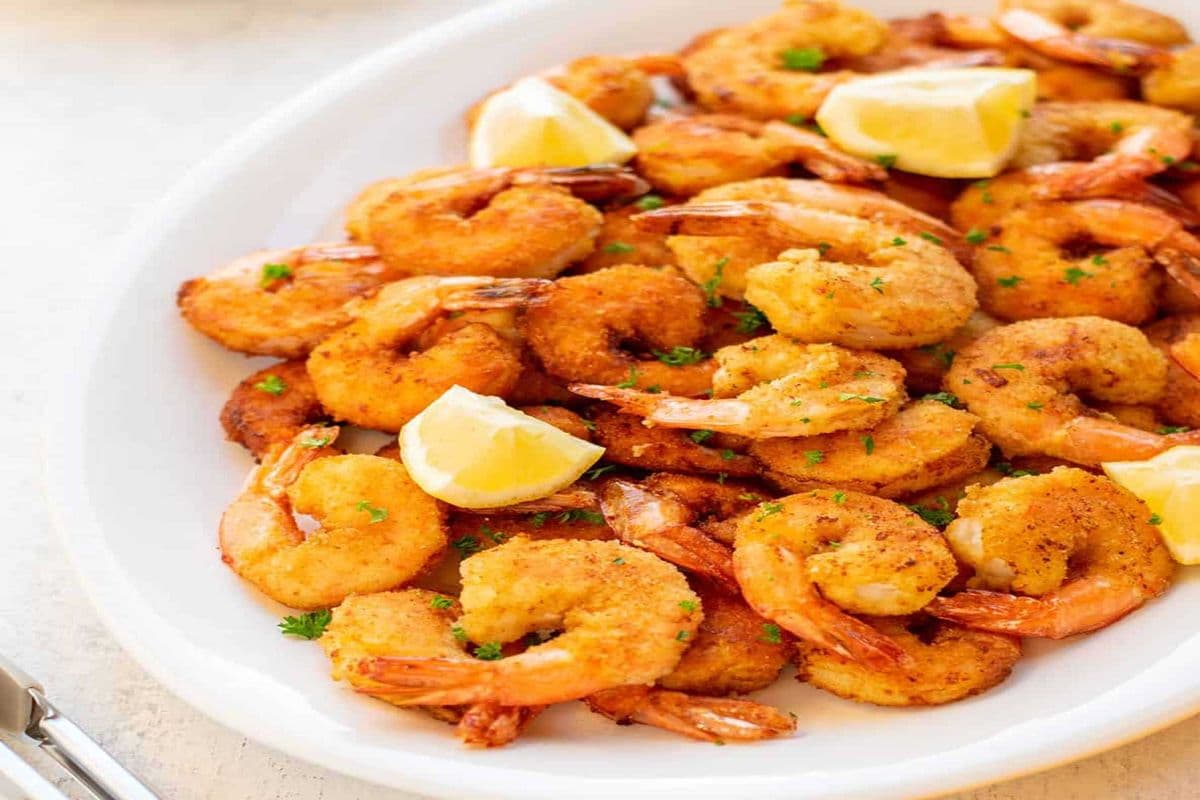 74. Battered Jumbo Shrimp Tossed with Your Choice of Sauce