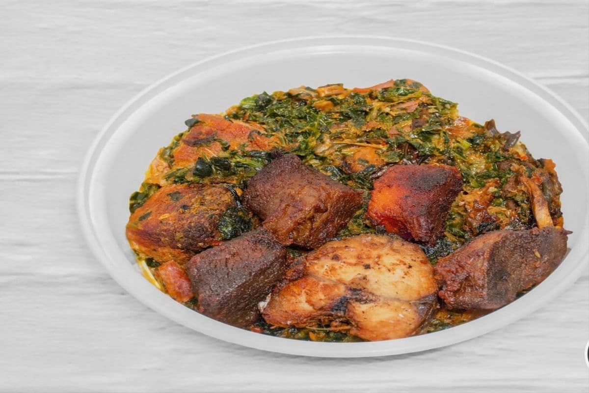 Vegetable Soup with Assorted Meat Served with Swallow