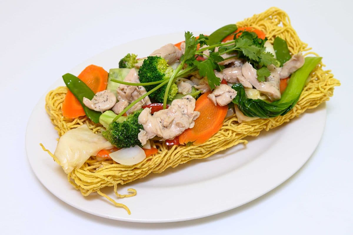 87. Stir Fried Chicken and Vegetables on Crispy Egg Noodle
