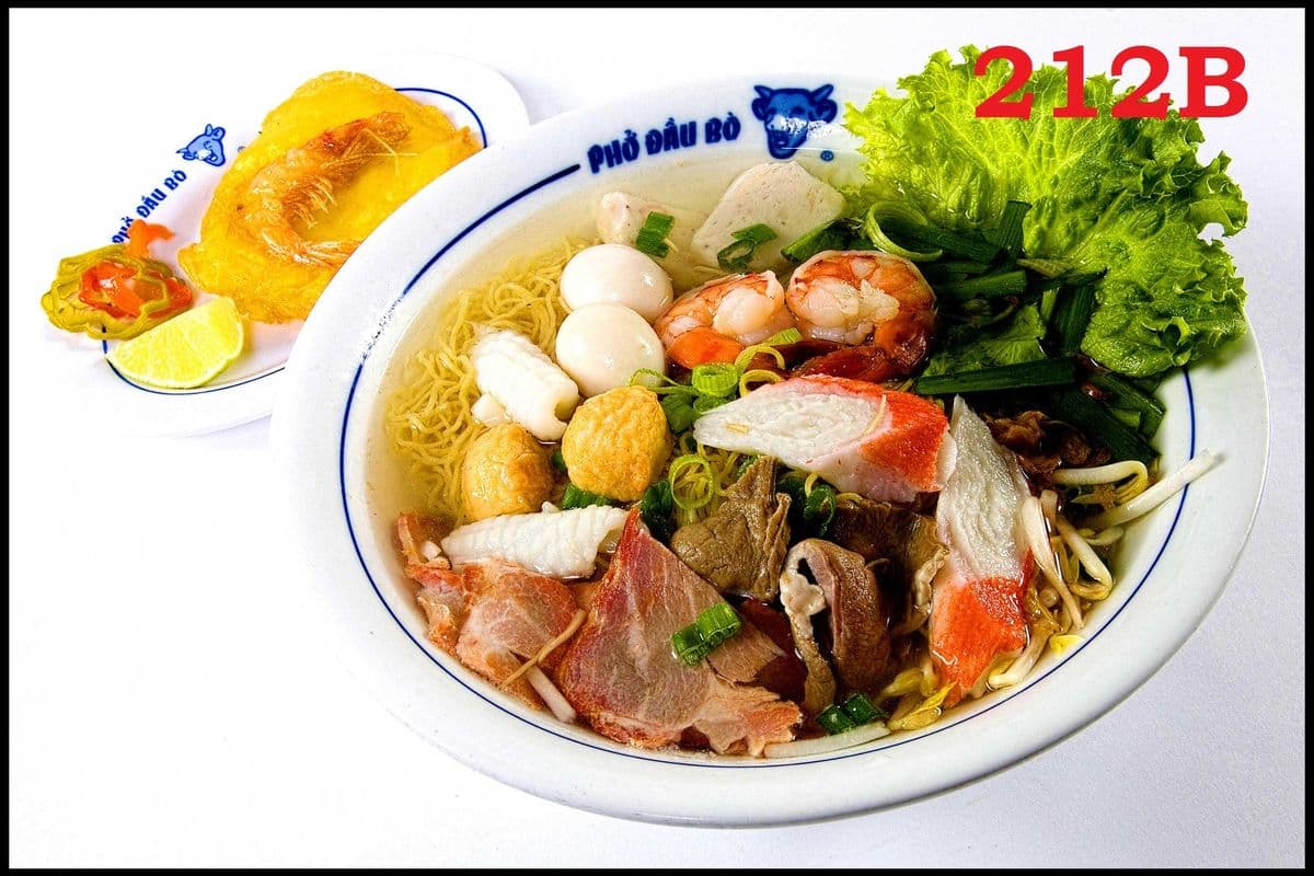 214. Seafood and BBQ Pork Egg Noodle and Rice Noodle Soup