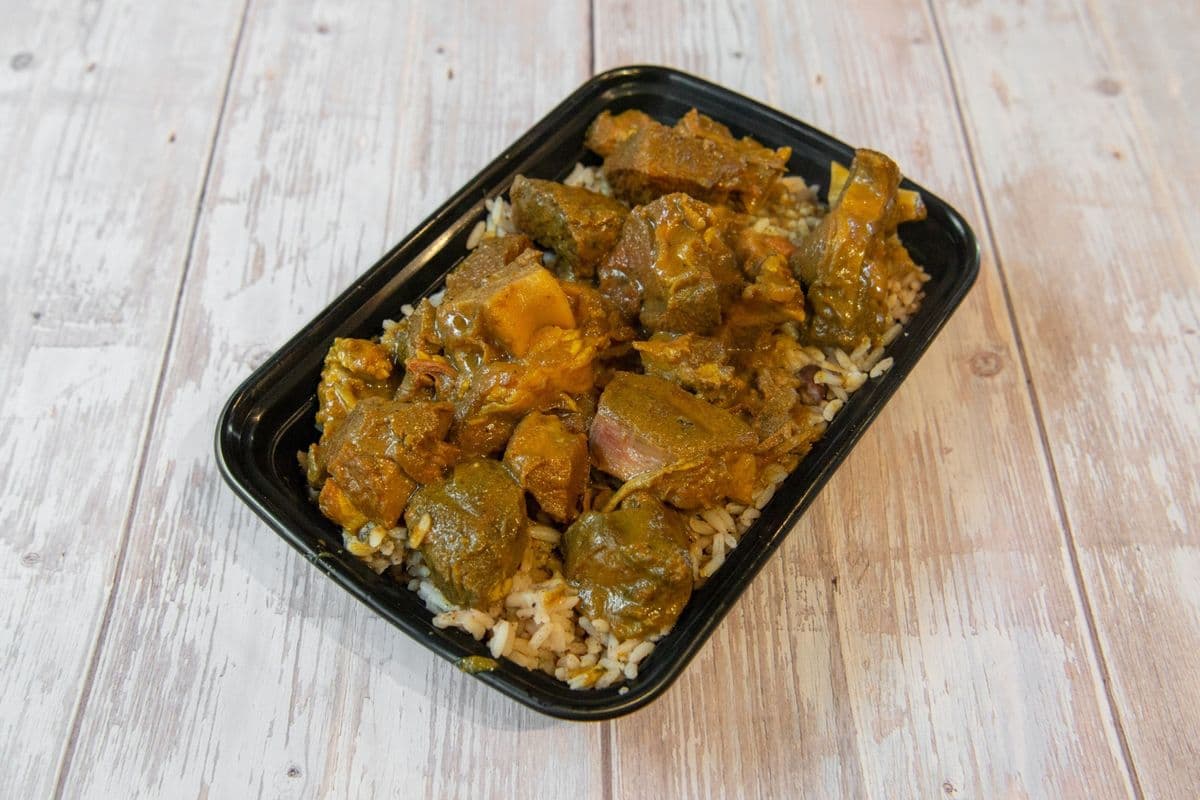 Curry Goat with Rice and Peas