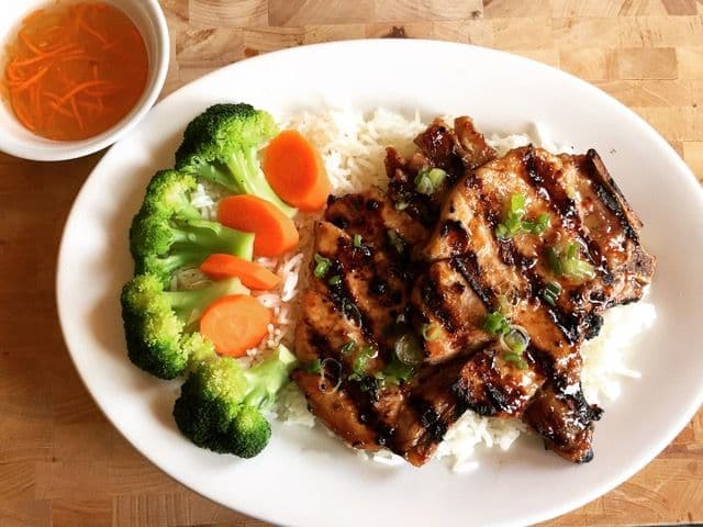 44. Pork Chops with Steamed Rice, Broccoli, and Carrots