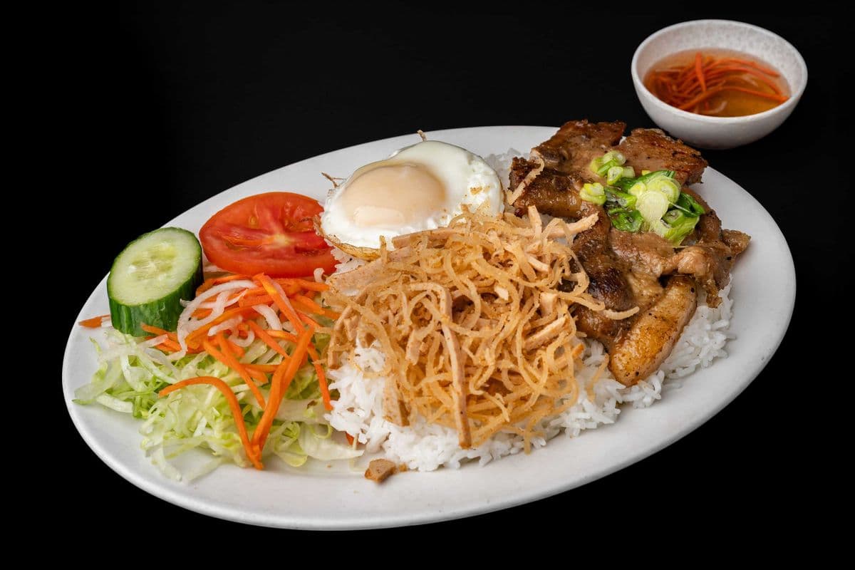31. Grilled Pork Chop, Shredded Pork Skin, and Fried Egg on Rice