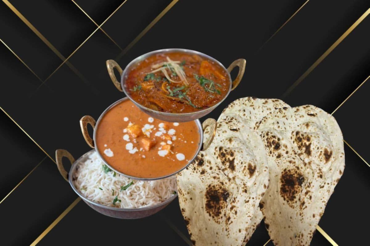 Lamb Curry, Shahi Paneer, Rice, and Three Pieces of Naan