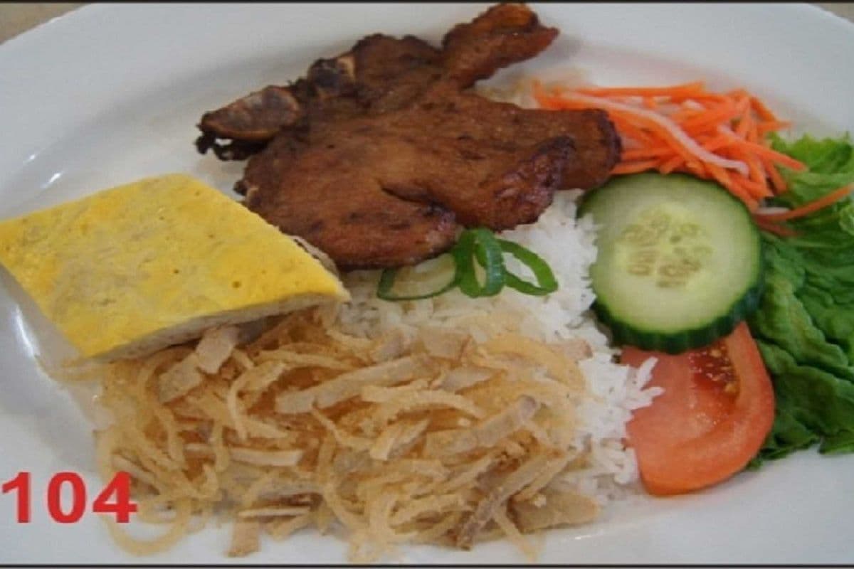 104. Steam rice with grilled pork chop, shredded pork, and steamed egg quiche.