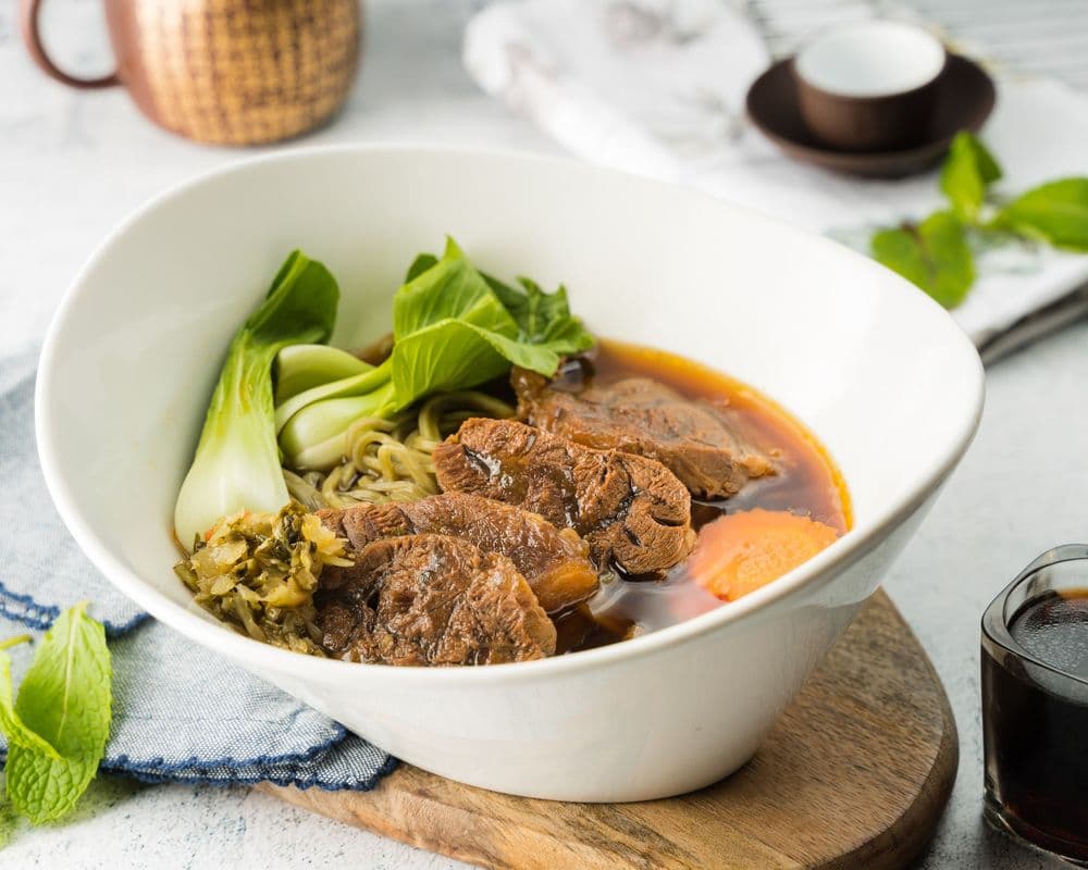 N17. Spicy Pu-Erh Beef with Green Tea Noodle Soup