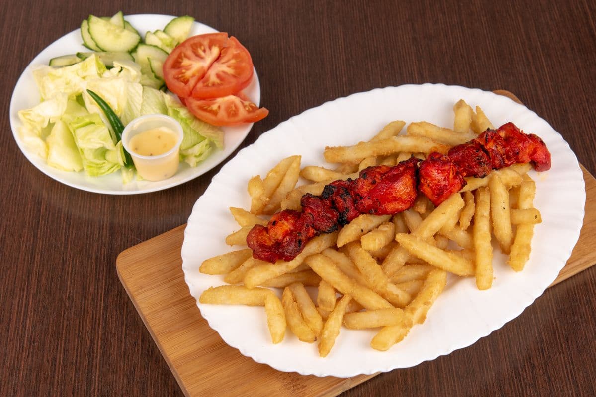7. Chicken Leg with Fries and Salad