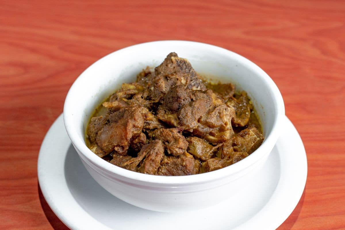55. Curry Goat with white rice