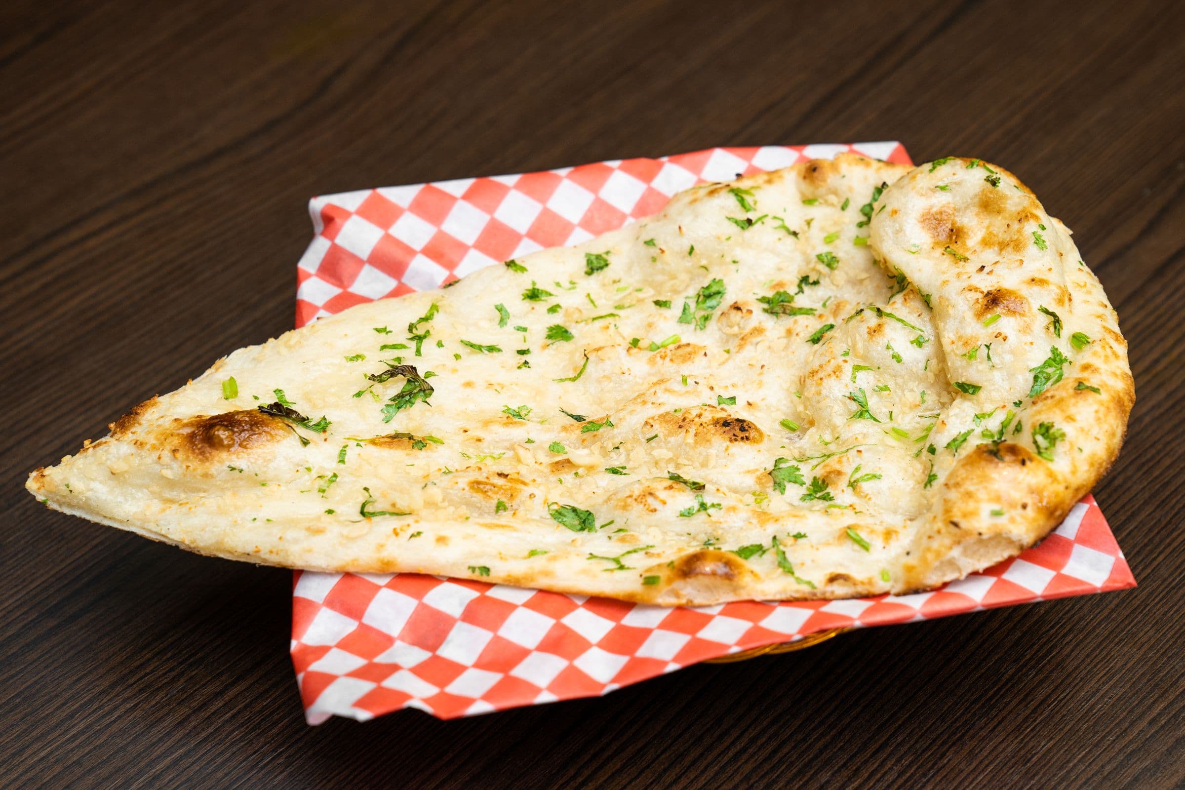 77. Garlic Naan (1 pc)