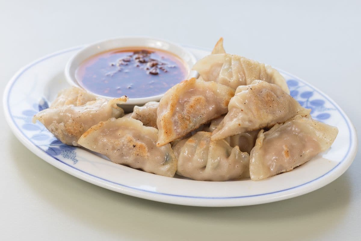 A6. Sizzling Chinese Pork Dumplings (14 pcs)