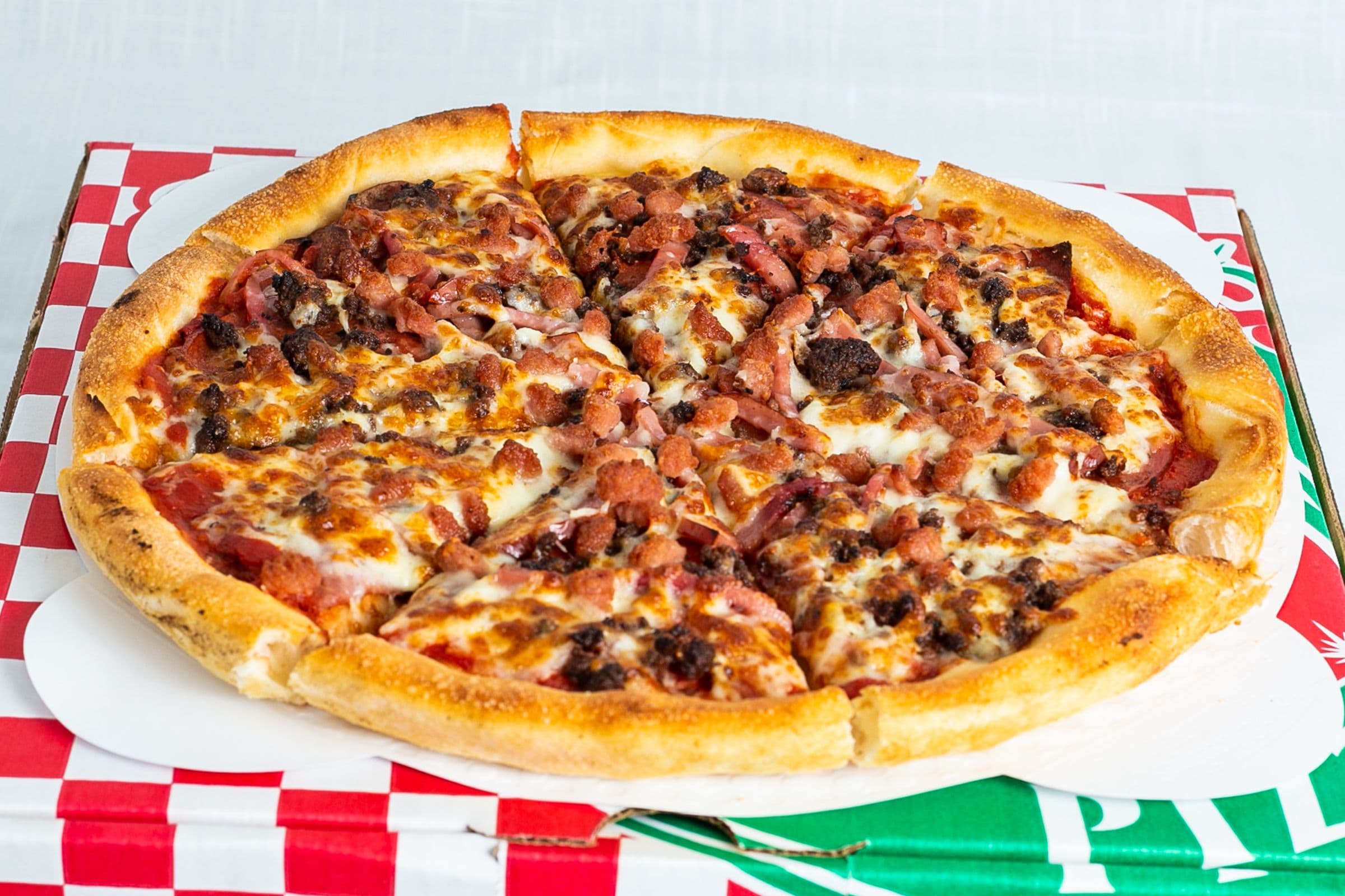 39. Two Medium Ultra Meat Pizzas