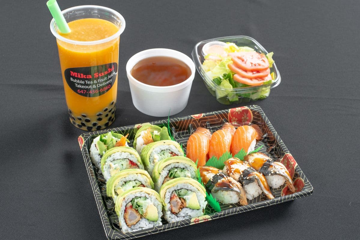 PC12. Green Dragon Roll (8 pcs), Salmon Sushi (3 pcs), and Eel Sushi (3 pcs)