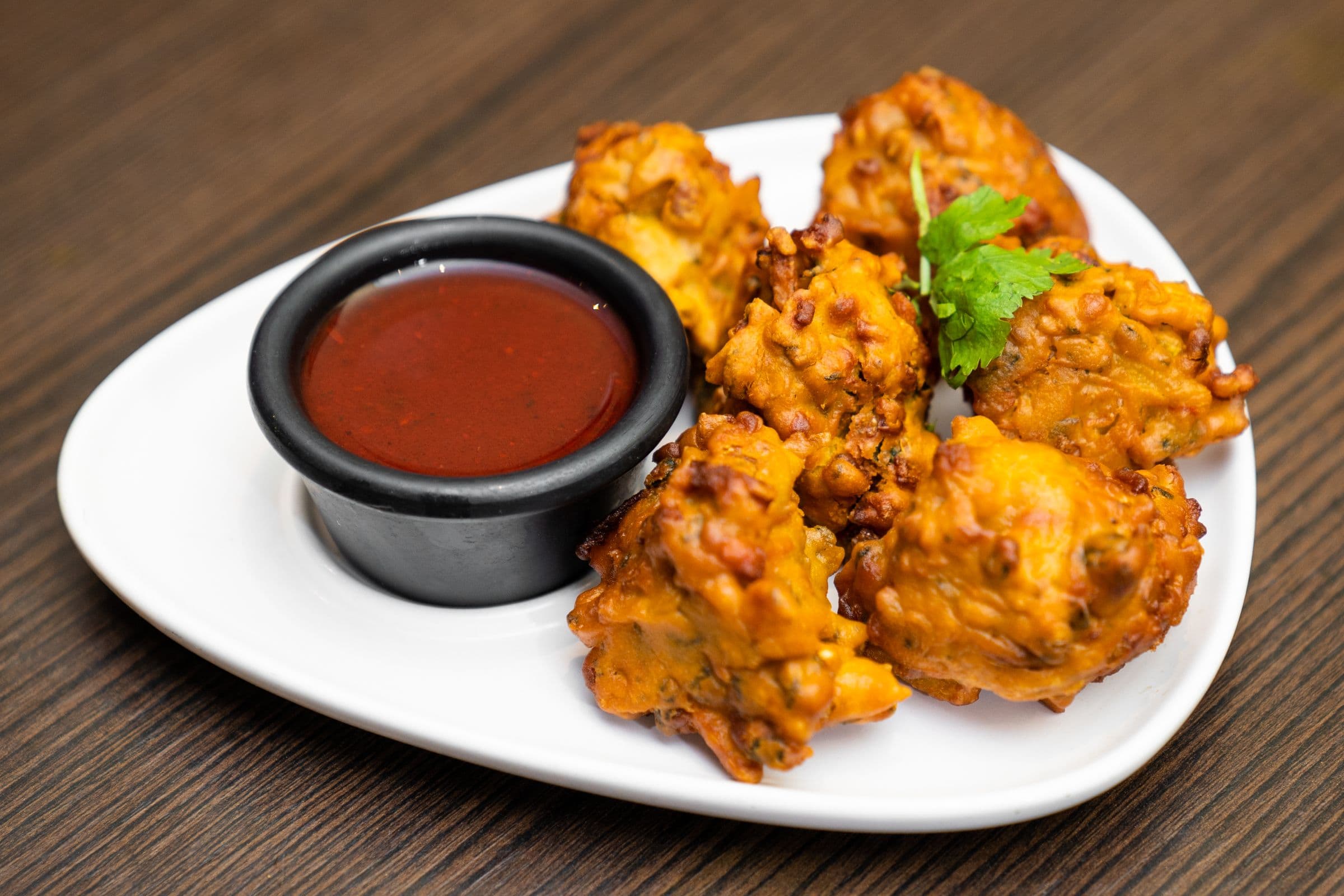 4. Vegetable Pakora or Onion Bhaji (7 pcs)