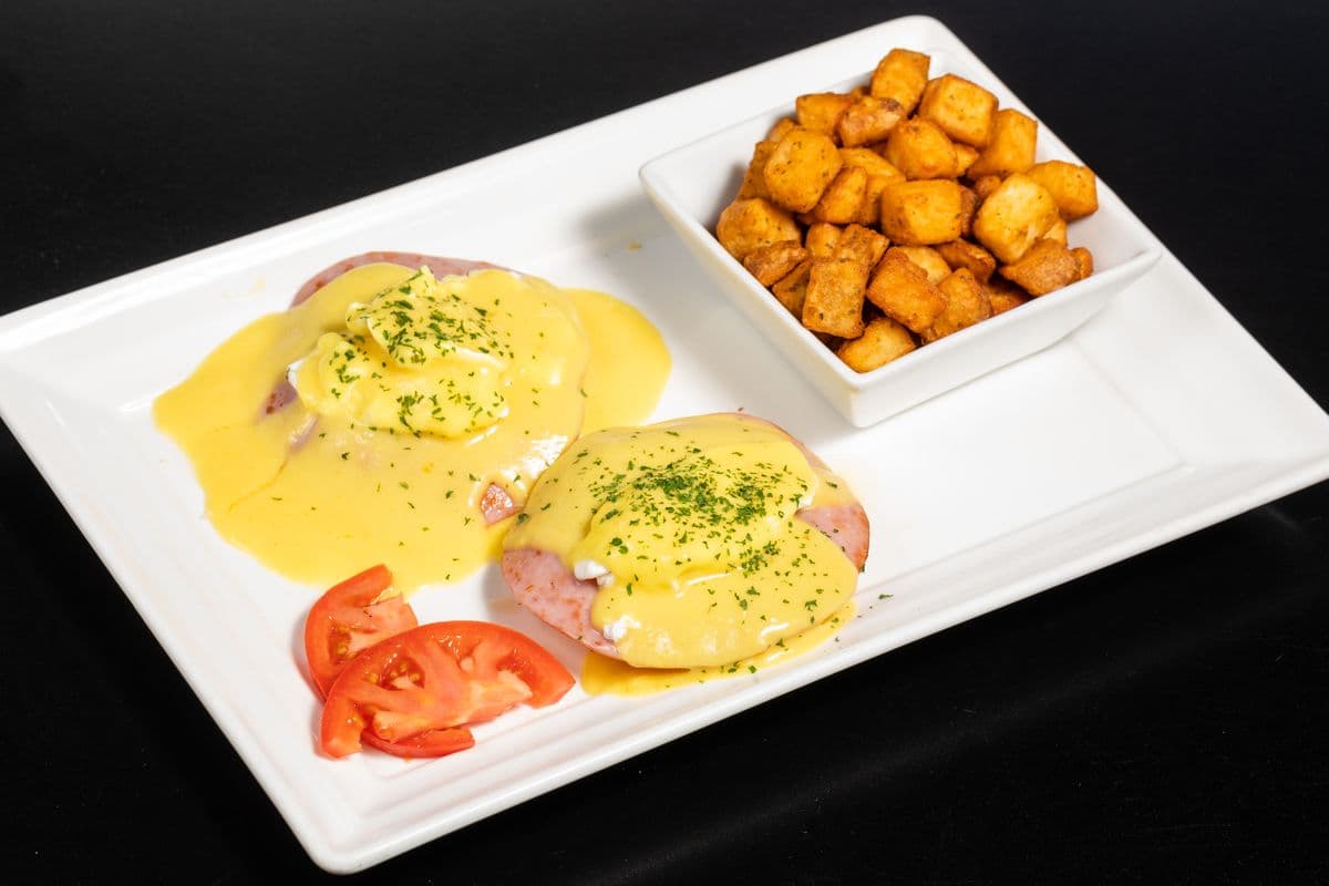 10. Eggs Benedict with Ham or Salted Spinach and Home Fries