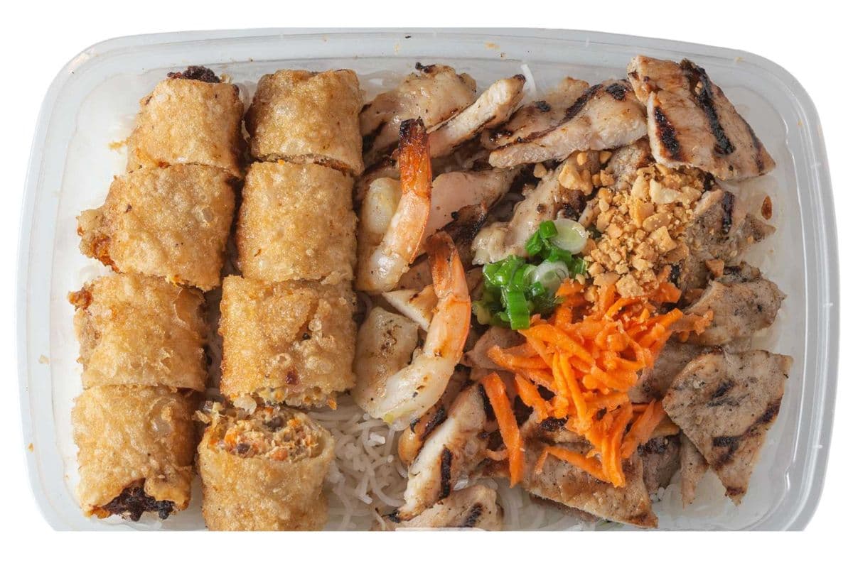 62. Grilled Shrimp, Chicken, Pork, and Beef with Two Spring Rolls on Vermicelli Noodles
