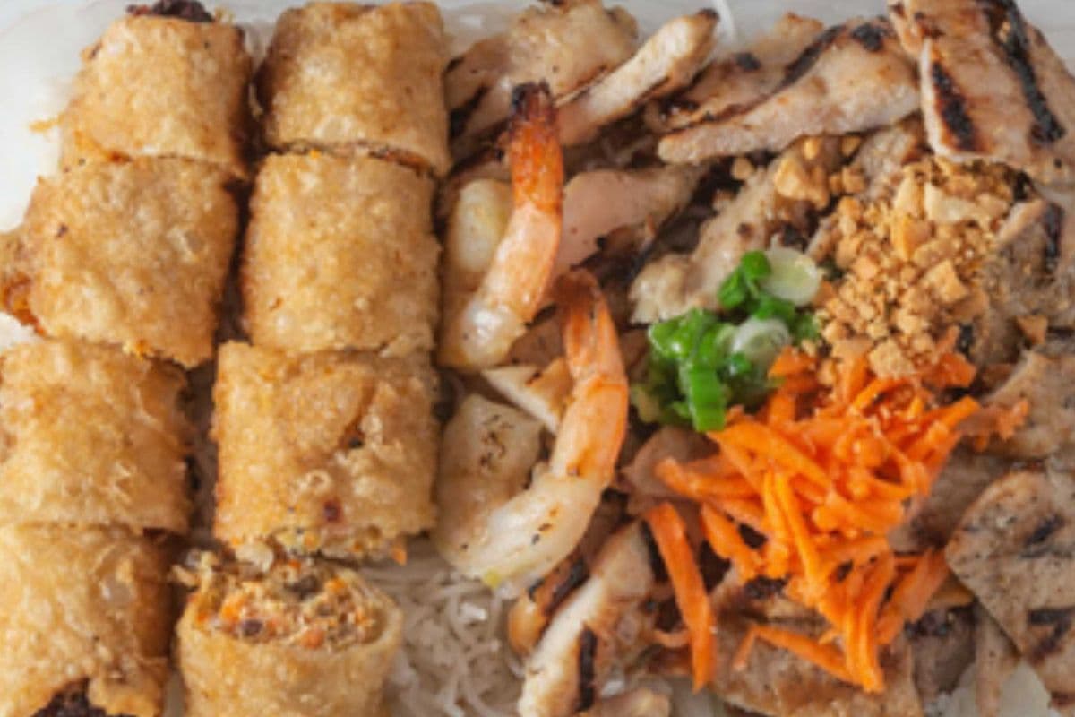 54. Grilled Chicken with Two Spring Rolls on Vermicelli Noodles