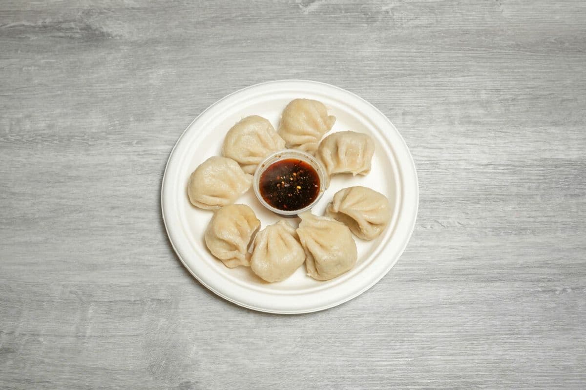 4. Steamed or Fried Dumplings (8 pcs)